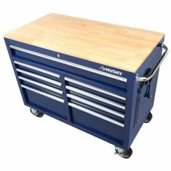 Husky 46 in. W x 24.5 in. D Standard Duty 9-Drawer Mobile Workbench Tool Chest with Solid Wood Top in Gloss Blue -ToolHub Shop gloss blue with silver trim husky mobile workbenches h46mwc9gbv2 1d 1000