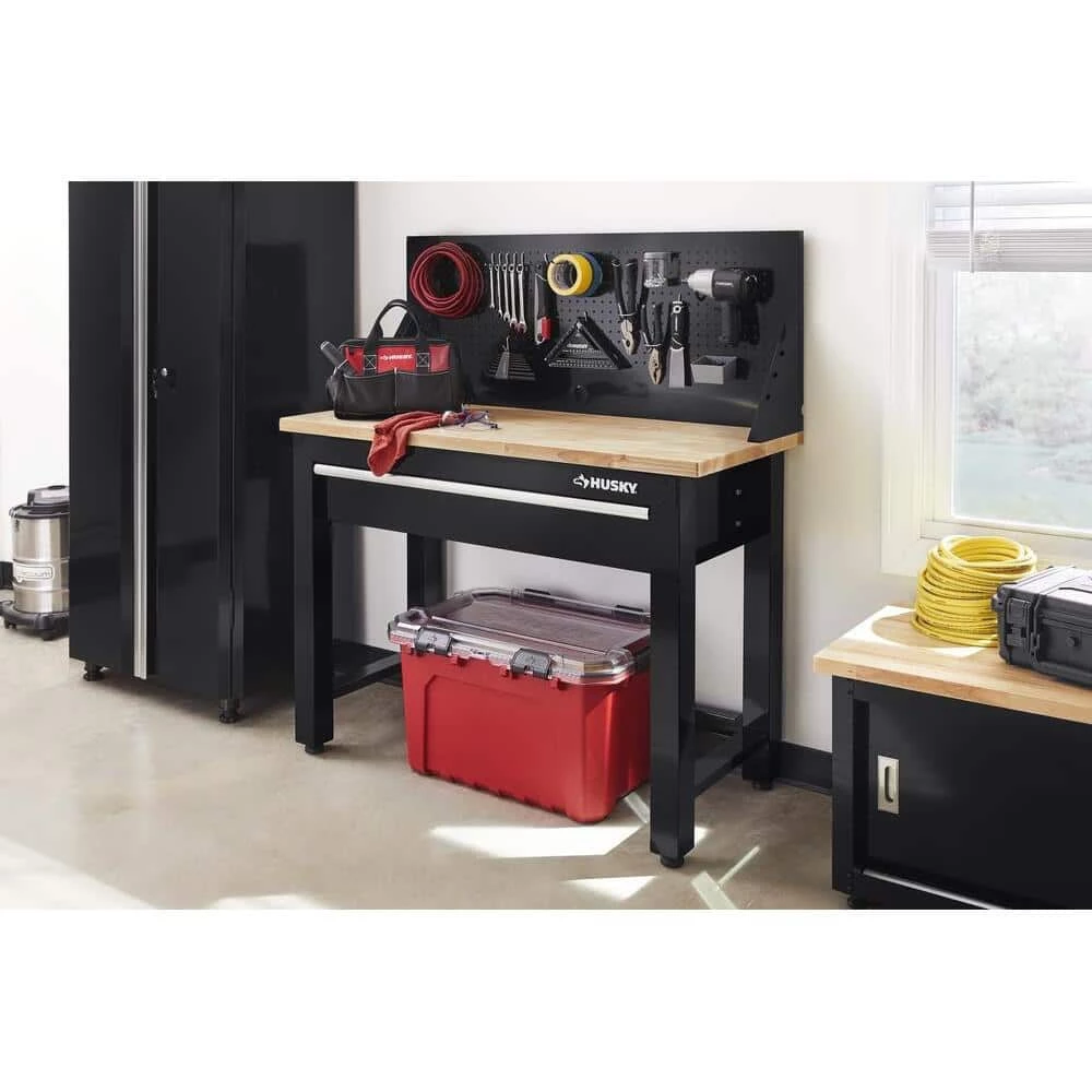 Husky 4 ft. Solid Wood Top Workbench in Black with Pegboard and 1 Drawer 4 Husky 4 ft. Solid Wood Top Workbench in Black with Pegboard and 1 Drawer - Image 2